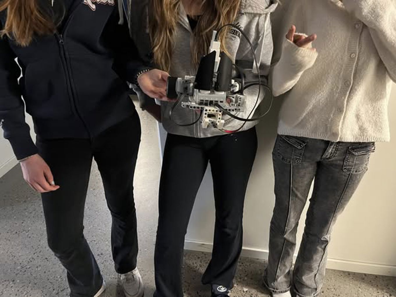 En gruppe mennesker som går En gruppe mennesker som går