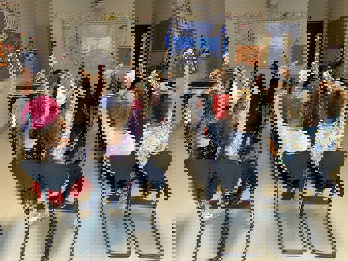 en gruppe barn som sitter i et klasserom en gruppe barn som sitter i et klasserom