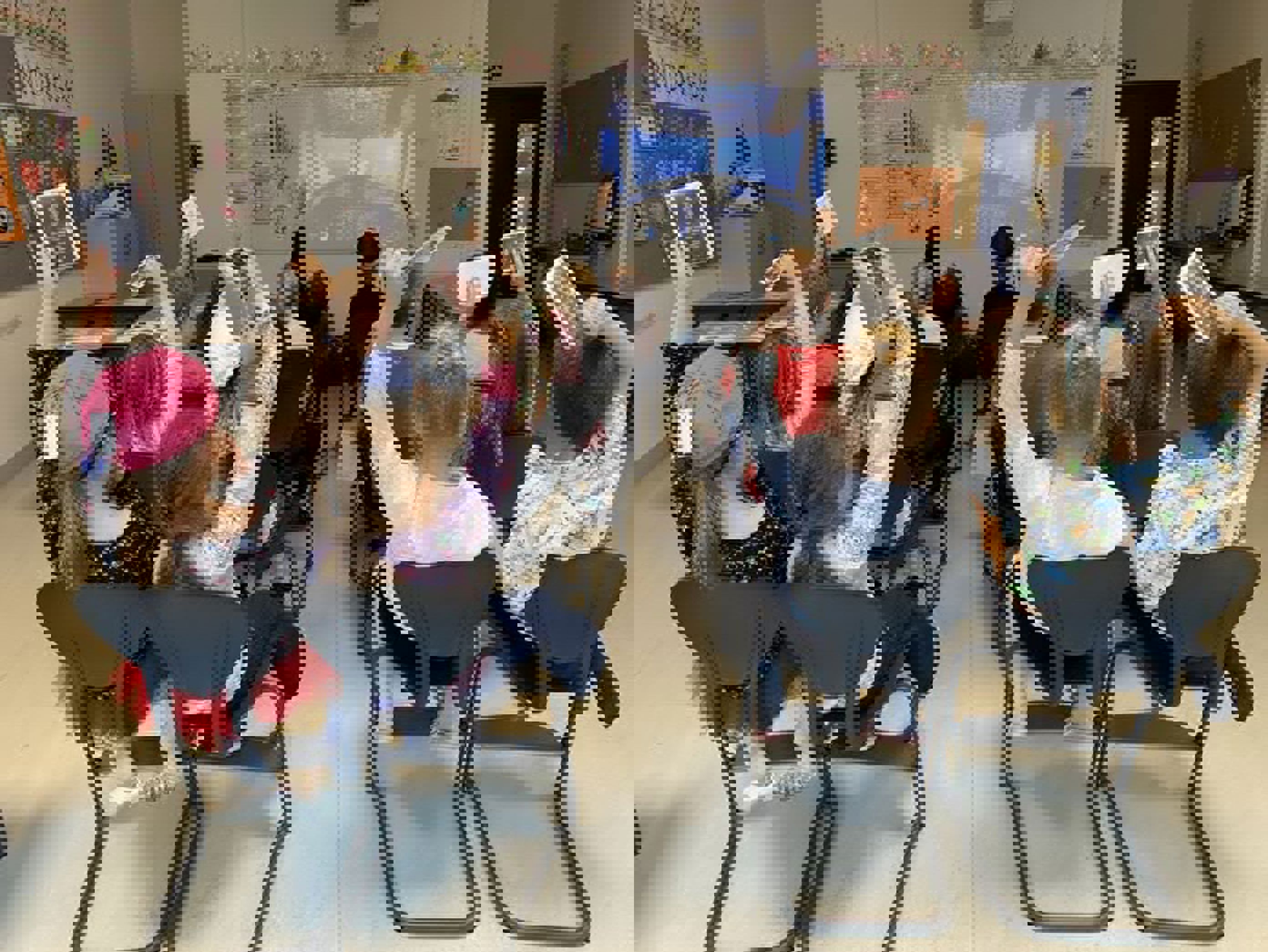 en gruppe barn som sitter i et klasserom en gruppe barn som sitter i et klasserom